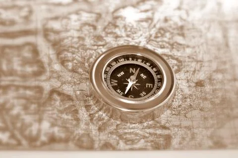 Tools for the journey - map and compass. Stock Photos