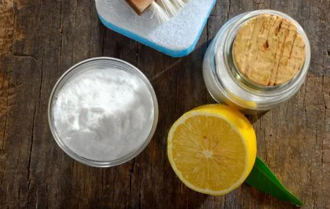 Tools with lemon and sodium bicarbonate on wood Free Stock Photos