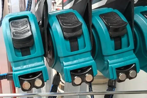 Tools lined up in vibrant colors ready for work in a hardware store Stock Photos