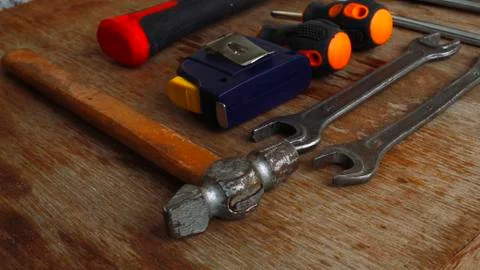 Tools lying wooden table Stock Photos