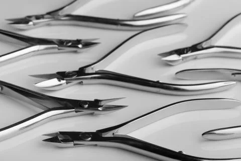 Tools of a manicure scissors on a white background Stock Photos