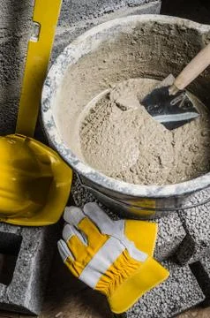 Tools of the mason and  bucket with a solution Stock Photos