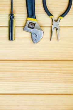Tools for master builder and accessories on wooden background Stock Photos