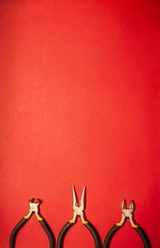 Tools for master builder and accessories on red background Stock Photos