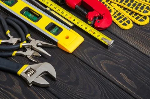 Tools for master builder on a black boards. Wizard working environment Stock Photos