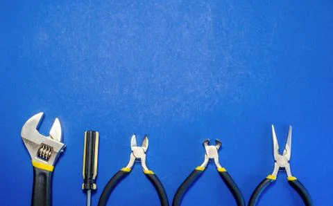 Tools for master builder on blue background Stock Photos