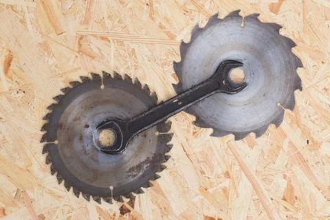 Tools on osb panel with copy space. Carpenter workplace on wooden background Stock Photos