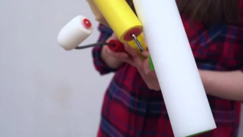 Tools for painting are twisted in hands Stock Footage 201609308