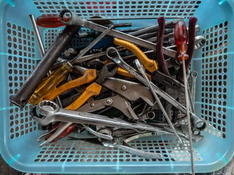 Tools in the plastic basket Stock Photos