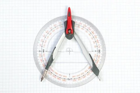 Tools for Plotting compass and protractor. On a white background. Fotos de archivo