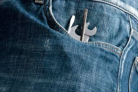 Tools in the pocket of jeans Stock Photos