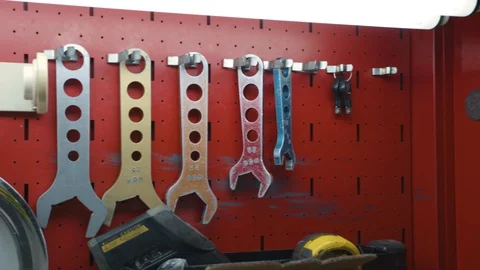 Tools on Rack, Slow Slide Shot Stock Footage 128144731