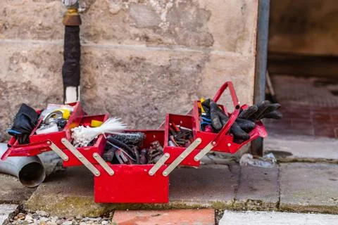 Tools in red toolbox Stock Photos