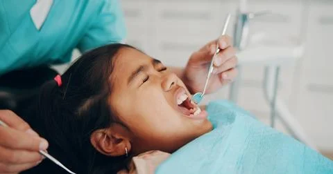 Tools, scared and child at dentist for consultation, checkup and medical se.. Stock Photos