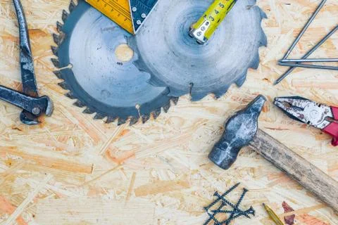 Tools set on osb panel with copy space. Carpenter workplace on wooden background 스톡 사진