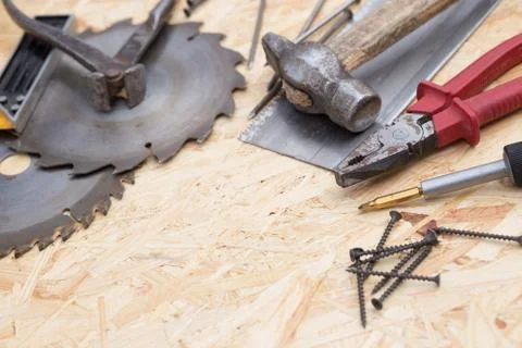 Tools set on osb panel with copy space. Carpenter workplace on wooden background 스톡 사진