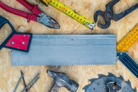 Tools set on osb panel with copy space. Carpenter workplace on wooden background Foto stock