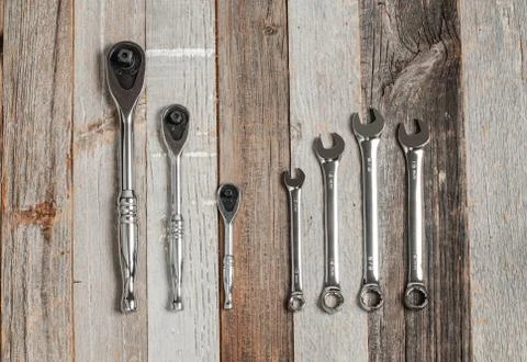 Tools, set wrenches on a wood background. Top view Фото