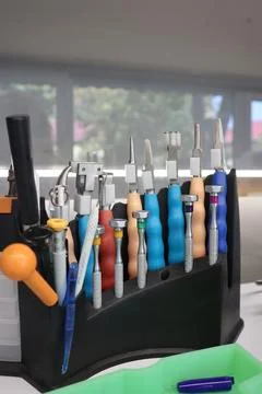 Tools on the table in the workshop for the production of vision glasses Stock Photos