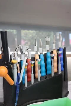 Tools on the table in the workshop for the production of vision glasses Stock Photos