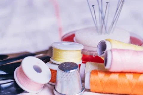 Tools for tailor, instruments for practicing sewing on a white background. Stock Photos