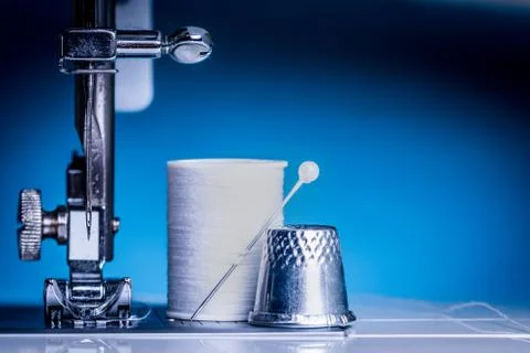Tools for tailor, instruments for practicing sewing on a blue background. Stock Photos