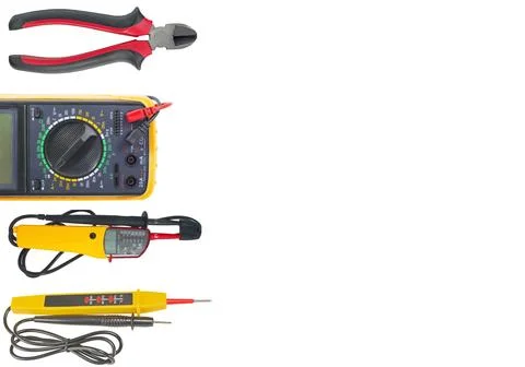 Tools to use in electrical installations on white Stock Photos