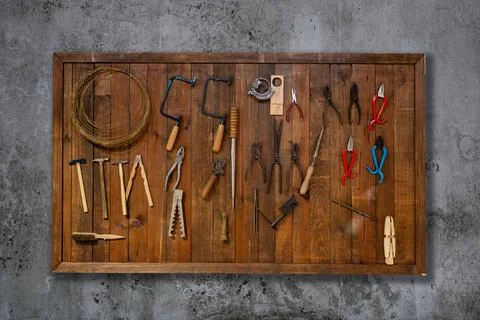 Tools on wall hanging at a carpentry workshop Foto stock