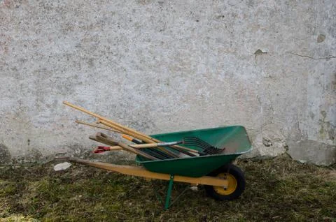 Tools in a wheelbarrow Stock Photos