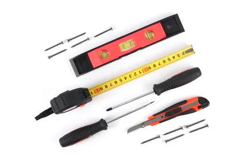 The tools on a white background screw driver meter nippers cutter Stock Photos