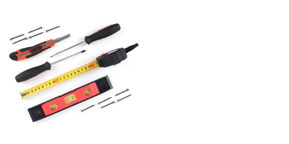 The tools on a white background screw driver meter nippers cutter Stock Photos