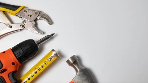 Tools on a white background with space for text. Top view. Foto stock