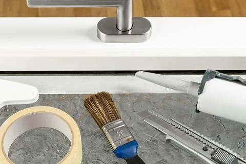 Tools on windowe frame Stock Photos