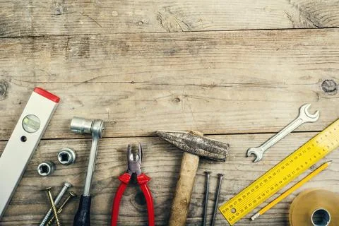 Tools on wooden background with copy space Stock Photos