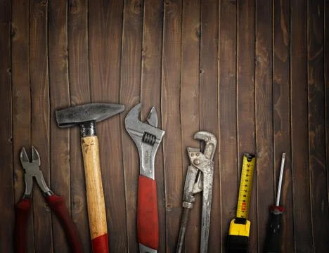 Tools on wooden background Stock Photos