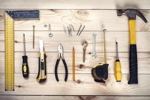 Tools on wooden background Stock Photos