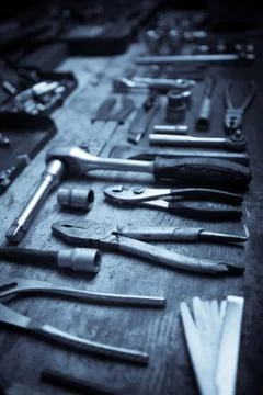 Tools on wooden plank Stock Photos