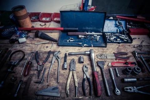 Tools on wooden plank Stock Photos