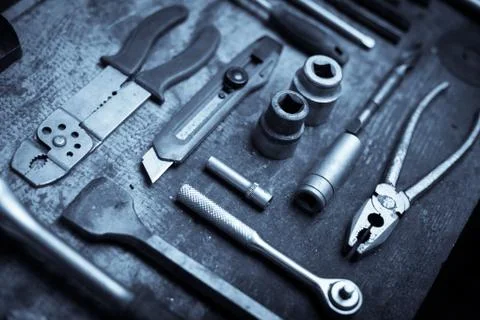 Tools on wooden plank Stock Photos