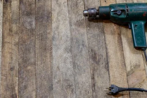 Tools on a wooden table in an old workshop. Arranged on the edge of the table Stock Photos