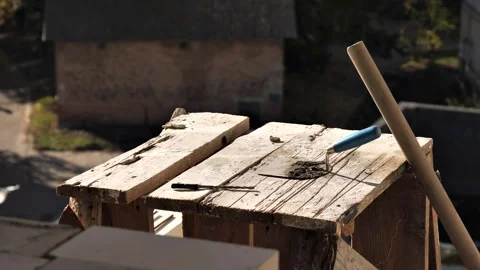 Tools for work are lying on the builder's scaffolding Stock Footage 270518968