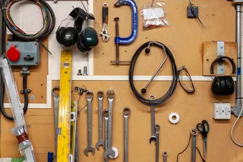 Tools in a workshop hanging on the wall Stock Photos