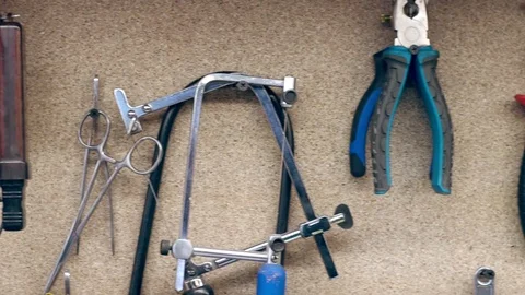 Tools on the workshop wall Stock Footage 99772908