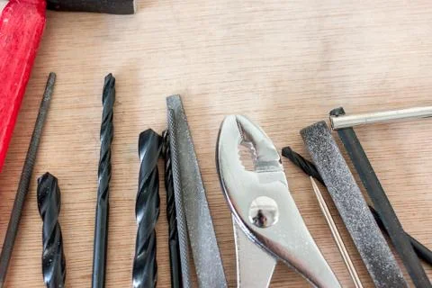Tools in workshop on wooden background Stock Photos