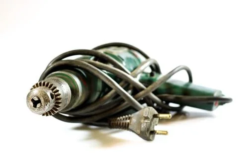 Tools for workshop work. Drill, grinder, scoop and screwdriver. White backgro Stock Photos