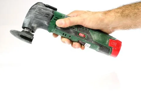 Tools for workshop work. Drill, grinder, scoop and screwdriver. White backgro Stock Photos