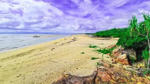 Toomulla Beach with cloudy sky Stock Photos