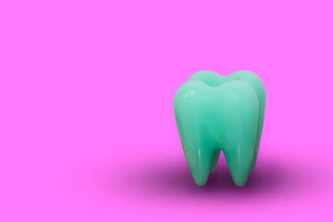 Tooth and dentist and pink background. Stock Photos