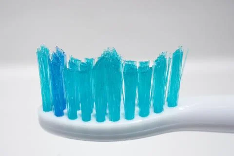 Tooth brush and toothpaste on blurred background. Stock Photos