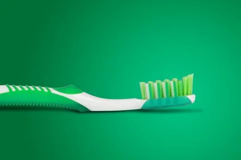 Tooth brush in blue background Stock Photos